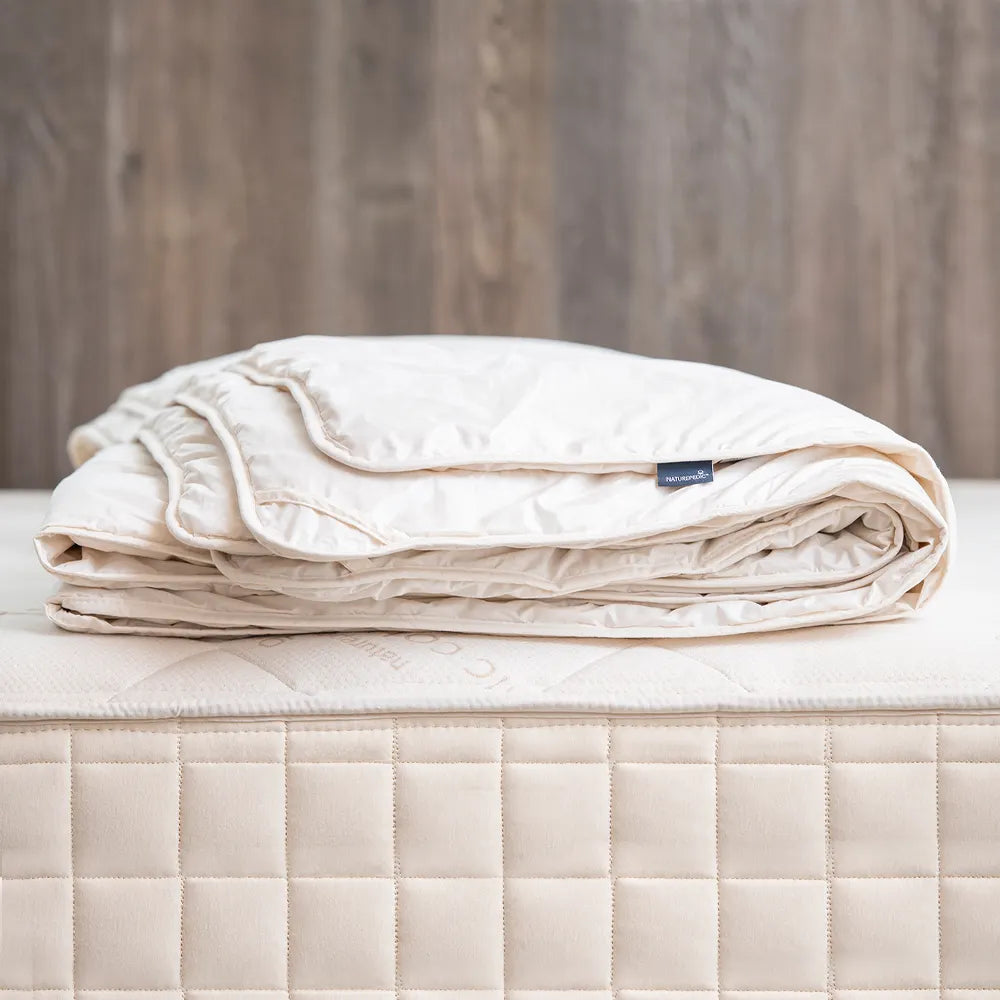 Naturepedic Adagio 2” Organic Latex Topper layer on top of mattress 