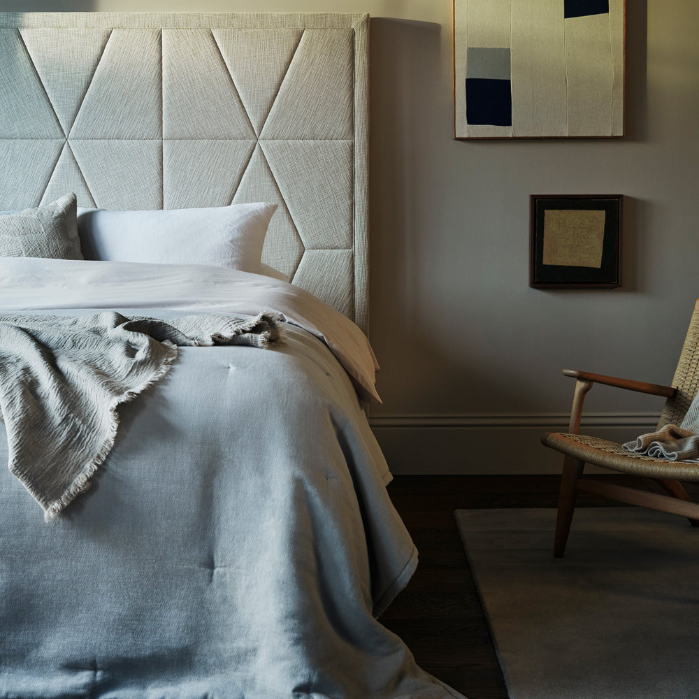 Vispring Sublime Superb on Sovereign Divan in a fully dressed bedroom.